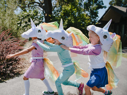 Glowing horn unicorn, A unicorn costume with a light-up horn and a matching tail.